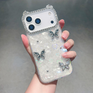 Custodia per cellulare IMD con gradiente, fiocco a conchiglia e farfalla per <span class=keywords><strong>iPhone</strong></span> 17 16 15 Pro Max, <span class=keywords><strong>cover</strong></span> posteriore iridescente con diamanti e effetto <span class=keywords><strong>arcobaleno</strong></span> - Product Image 2