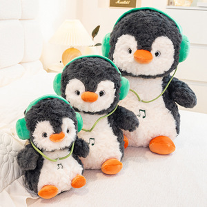 Pingüino de peluche premium, suave y adorable, con auriculares verdes, para niños, regalo sorpresa. - Product Image 4