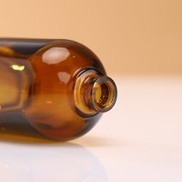 Botol parfum kaca Amber bulat 30ml 50ml 100ml dengan tutup bambu dan penyemprot pompa tipe segel elegan