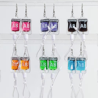 Nouvelles boucles d'oreilles Halloween personnalité Plasma AB sac de transfusion sanguine couleur liquide sang Pack longues boucles d'oreilles pour hommes et femmes