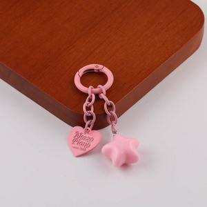 Llavero de Metal de Aleación de Zinc con Forma de Estrella y Diseño en Relieve, Opciones Multicolor para Accesorio de Bolso - Product Image 1