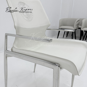 Silla de Comedor Personalizable Keynes de Cuero Sintético Blanco con Estructura de Acero Inoxidable, Venta al Por Mayor para Uso Comercial - Product Image 4