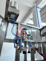 Machine de remplissage de gaz pneumatique entièrement automatique, haute efficacité, haute précision, pour les canettes aérosols, les bouteilles, la production chimique et cosmétique