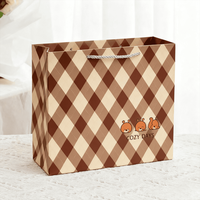 Nouveautés Sac en papier cadeau vente en gros bon marché sous-vêtements cosmétiques Shopping Emballage fourre-tout réutilisable directement de l'usine avec logo imprimé