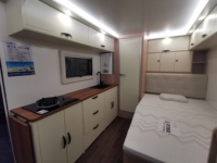 Vente en gros de caravanes de voyage sur route XIXUNLONG légères en aluminium, modernes, pour 4 personnes, de haute qualité, avec cuisine complète