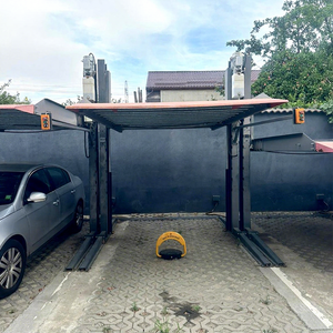 Sistemas de Estacionamiento con Elevador Hidráulico de 2 Postes para Sótano - Product Image 1