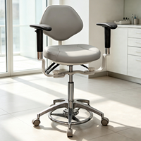 Chaise de travail ergonomique pour microscopes dentaires avec double accoudoir et repose-pieds pour clinique