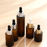 Vente en gros d'usine : flacon compte-gouttes en verre ambré durable de 10, 15 ml et 100 ml pour les soins de la peau, des cheveux et les huiles essentielles