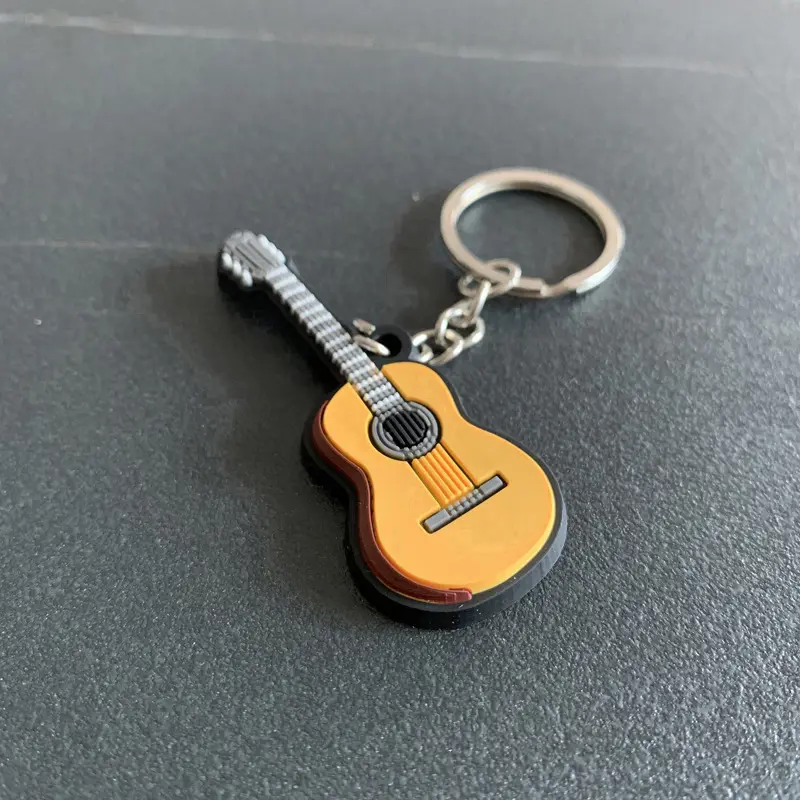 Porte-clés personnalisé pas cher prix 2D gaufré personnalisé silicone PVC caoutchouc guitare pas cher