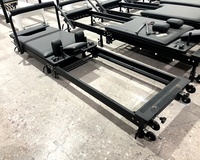 Machine pliante en aluminium de réformateur de Pilates de lit de noyau pliable léger de marque OEM populaire pour studio de yoga