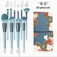 Ensemble de 10 pinceaux de maquillage professionnels vegan en poils synthétiques gris foncé de luxe avec manche en bois pour le visage et les yeux