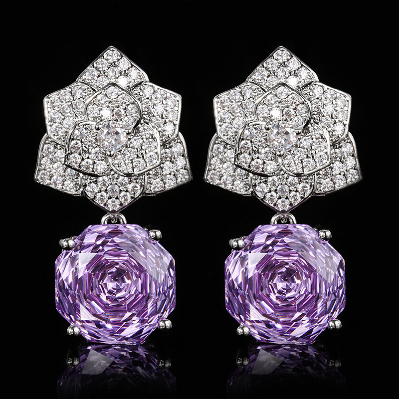 clous d'oreilles violets