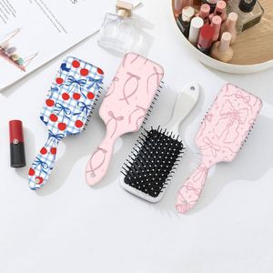 Brosse à cheveux Massage du cuir chevelu Peigne élément explosif Bow Print Pattern Salon Hairdressing Brush Curly Straight Air Cushion Peignes - Product Image 1