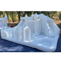 Château gonflable commercial blanc et vert avec toboggan, parc aquatique gonflable humide/sec