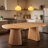Table à manger ronde minimaliste avec plateau extensible transformable en table longue pour les réceptions