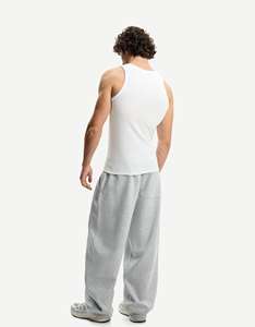 Tank Top Pria Katun Putih Berkualitas Tinggi Model Muscle Fit Rajutan Rib Tanpa Lengan untuk Olahraga Gym Custom Grosir - Product Image 5