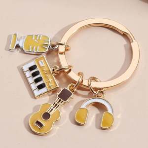 Porte-clés piano musical Porte-clés en émail Porte-clés mignon Instrument Violon Notes Clavier Casque Porte-clés musique - Product Image 4