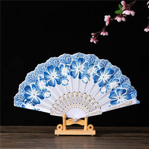 Nouvel an chinois feuille d'or multicolore espagnol imprimé <span class=keywords><strong>tige</strong></span> blanche grande fleur Design poudre d'or étranger <span class=keywords><strong>bambou</strong></span> ventilateur pliant - Product Image 1