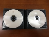 Lengan CD DVD PP Non-tenun dengan Bahan Yang Berbeda Gram/Ketebalan Warna Putih Jernih 100 Buah Dalam Satu Kemasan