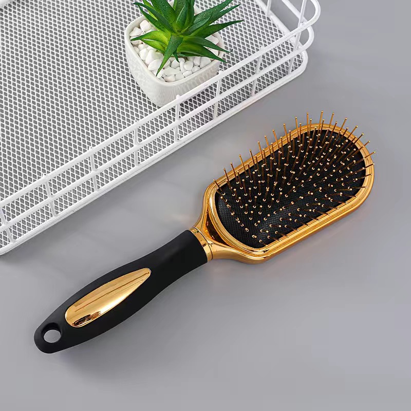 #3 Brosse à cheveux électrique