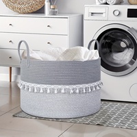 Vente en gros Nouveau style de panier à linge en coton tissé avec pompon Panier de rangement pour jouets et serviettes de chambre d'enfant Poubelle avec longues poignées