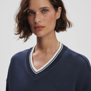 ชุดเทนนิสทรงเอไลน์สำหรับผู้หญิง แบบสั่งทำพิเศษ เนื้อผ้าระบายอากาศ เสื้อกอล์ฟแขนยาวเอวสูงยืดหยุ่น พิมพ์ลายด้านหน้า - Product Image 2