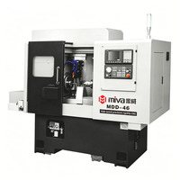 Tour CNC de précision à double broche MDD haute efficacité pour usinage intensif avec banc à haute rigidité et commande intégrée