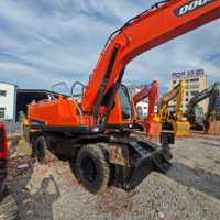 Vente en gros à bas prix, Excavatrice sur pneus d'occasion Doosan DX210W-9C d'origine, 20 tonnes, faible nombre d'heures de travail