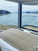 Maison préfabriquée en acier, capsule spatiale triangulaire, résistante au feu et à l'eau, à faible consommation d'énergie, type Apple Pod, pour une maison de vacances complète.