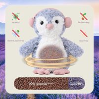 Peluche pingouin chauffante et rafraîchissante parfumée à la lavande avec cache-oreilles roses, animal en peluche lesté et doux