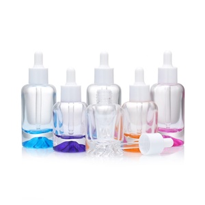 Botella de Vidrio con Gotero de Fondo <span class=keywords><strong>Volcánico</strong></span> Grueso, Venta al por Mayor, 30ml 1oz, Botellas de Vidrio de Lujo, Nuevo Estilo, Botella de Vidrio Transparente para Suero - Product Image 1