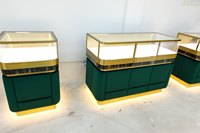 Comptoir de présentation de bijoux en verre LED personnalisé pour les boutiques de détail avec un design moderne et luxueux
