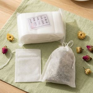 Wholesale 100Pcs Pack Non-toxic Non-woven Empty Filter Pocket Drawstring Design for Loose Leaf <b>Tea</b> and Spice <b>Infusing</b> <b>Tea</b> Bag - Product Image 1