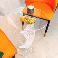 Présentoir rond acrylique transparent de table basse à la mode et conception moderne
