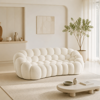 Grand canapé en tissu pour salon, mobilier de maison incurvé, luxe léger, design créatif et original, pouf de villa, canapé français haut de gamme