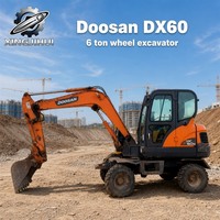 Prix Abordable – Modèle 2022 – Excavatrice sur Pneus d'Occasion Doosan DX60W 6 Tonnes – Matériel de Terrassement d'Occasion – Moteur Yanmar – Godet de 0,23 m³