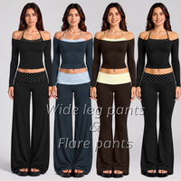 Ensemble deux pièces imprimé pois de créateur, haut à manches longues et épaules dénudées, pantalon évasé à jambes larges contrastant, tailles XS-XL, prêt à expédier