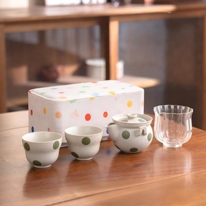 Service à thé Kung Fu rétro en céramique peinte à la main sous glaçure, motif vague et points, avec sac de voyage pratique (un pot, une tasse) - Product Image 1