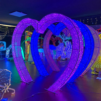 Nouvelle vente chaude Décoration Tunnel de mariage LED Arche lumineuse en forme de cœur Extérieur