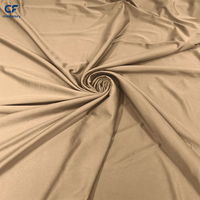 Tissu tricoté en gros couleur chair 66% Nylon 34% Spandex 160gsm extensible dans les 4 sens haute résilience séchage rapide respirant pour maillots de bain