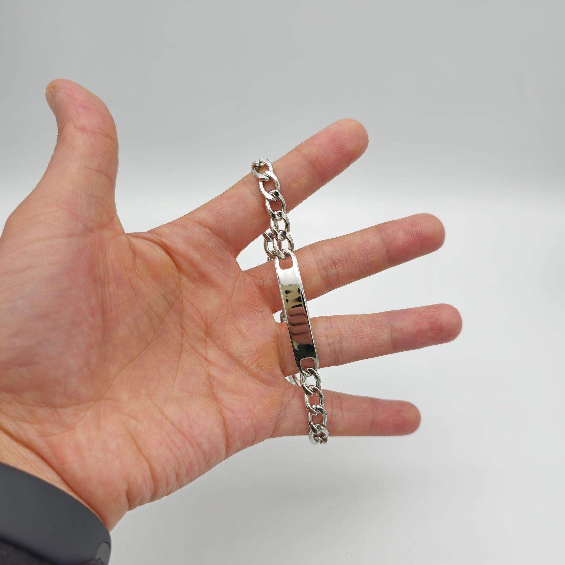 Steel-colored curved NK bracelet