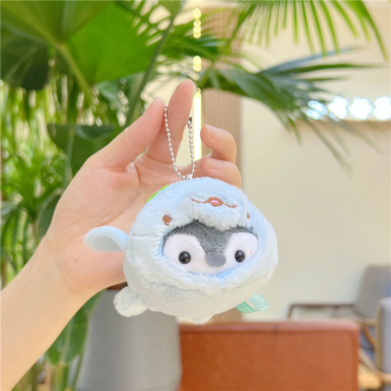 Light blue dolphin penguin necklace