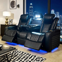 Canapé électrique de luxe en cuir avec surpiqûres diamantées, appui-tête réglable et éclairage d'ambiance LED pour salle de cinéma de villa
