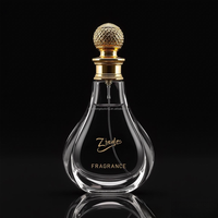 Nouvelle conception, flacons de parfum en verre transparent unisexes de 50 ml et 100 ml avec vaporisateur, logo personnalisé, boîte de luxe