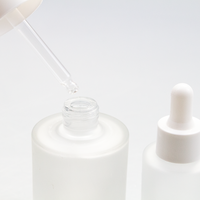 Bouteilles compte-gouttes plates en verre transparent dépoli, vides, de luxe, pour soins de la peau, huiles capillaires et huiles essentielles, 1oz 30ml 50ml, avec conception de couleur de logo personnalisée