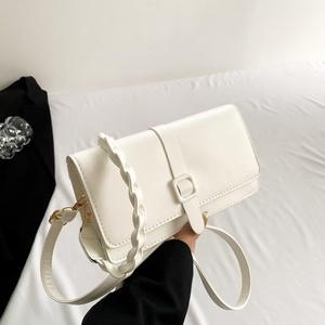 กระเป๋าสะพายคาดลำตัวทอพร้อมกระดุม - Product Image 6