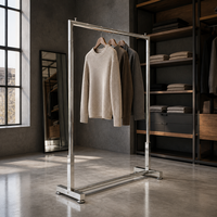 Porte-vêtements chromé à rail unique, joints soudés sans couture, base stabilisatrice, barre de montage facile, OEM/ODM, sur mesure pour boutique de vêtements