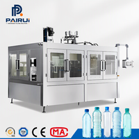 Machine de remplissage d'eau en bouteille haute performance pour usine d'eau potable en bouteille PET