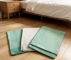 แผ่นรองกันน้ำแบบใช้แล้วทิ้งขนาดใหญ่พิเศษ ซึมซับดีเยี่ยม สำหรับผู้มีปัญหาปัสสาวะเล็ด ซึมซับได้มากเป็นพิเศษ สำหรับการตรวจทางการแพทย์ - Product Image 4