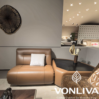 Canapé d'angle sans accoudoirs Vonliva en cuir écologique et chenille, avec fonction massage et rembourrage en éponge, pour salon